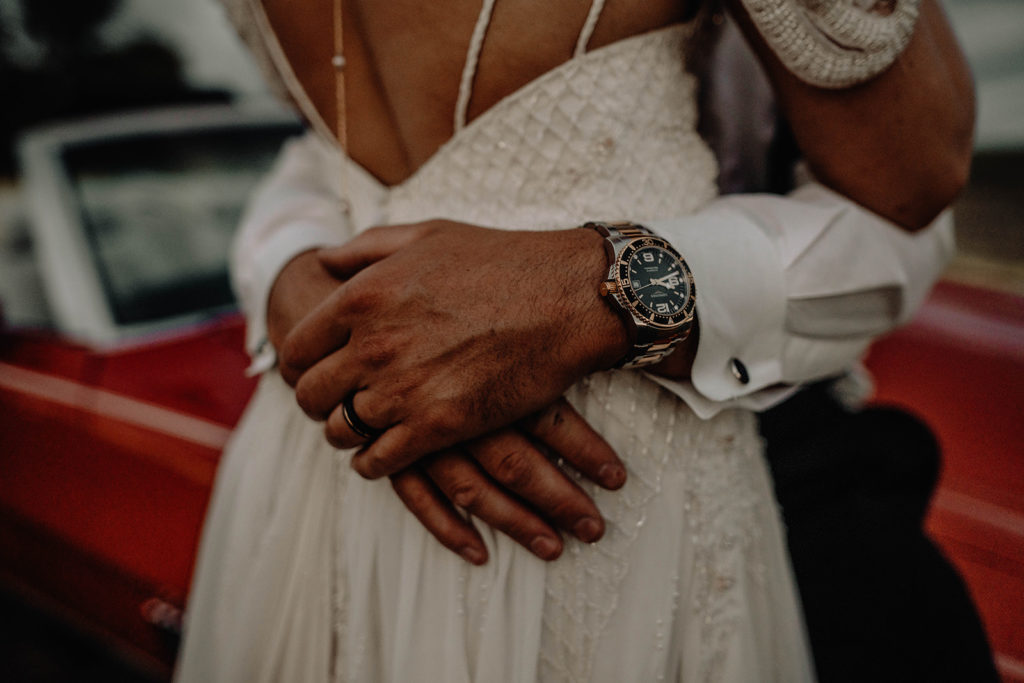Detail shot of grooms watch and wedding band during a Foster Creek Farm wedding