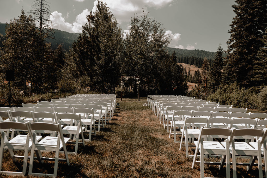 Chairs and archway ceremony set up at the Tamarack Resort wedding ceremony location
