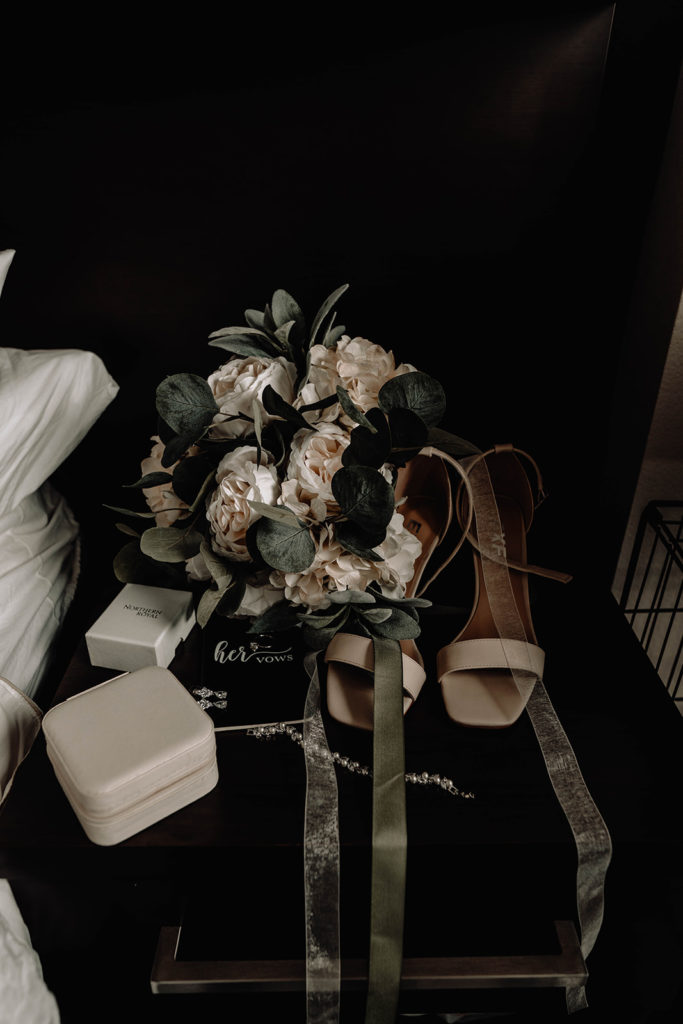 Detail shots of the bride's floral bouquet, shoes, and accessories as she gets ready for her downtown boise wedding day