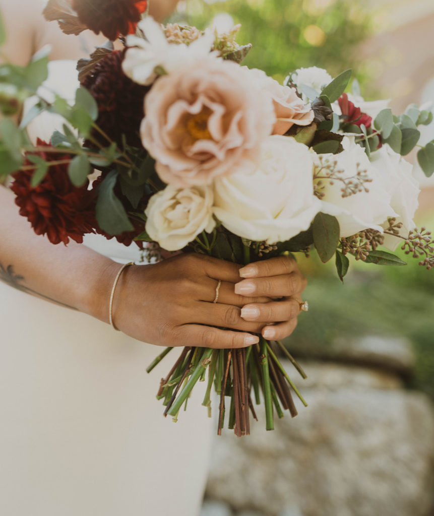 Close up photo of the bride's accessories and wedding bouquet in Spokane, Washington