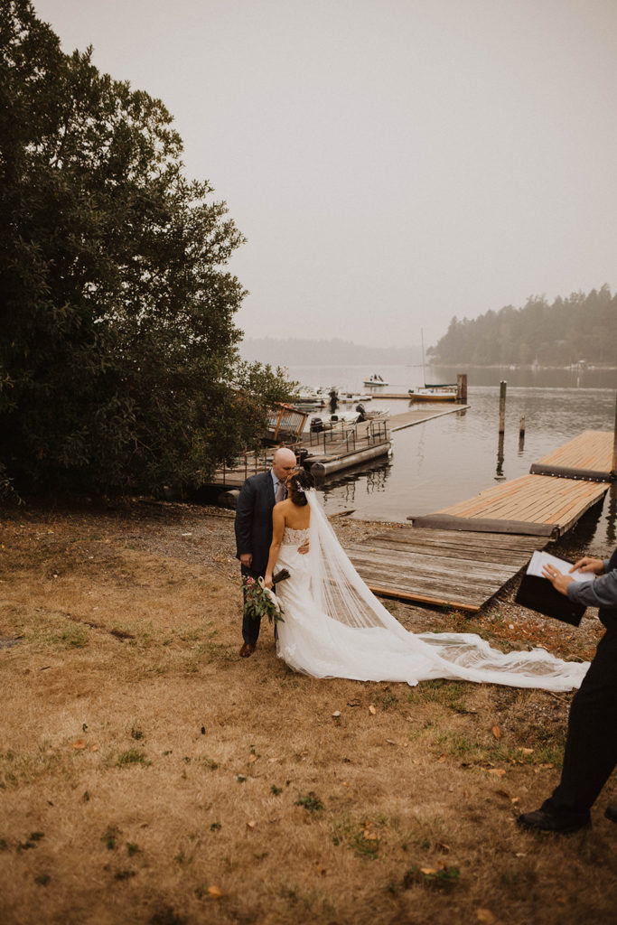 bride and grooms first kiss after their elopement ceremony
