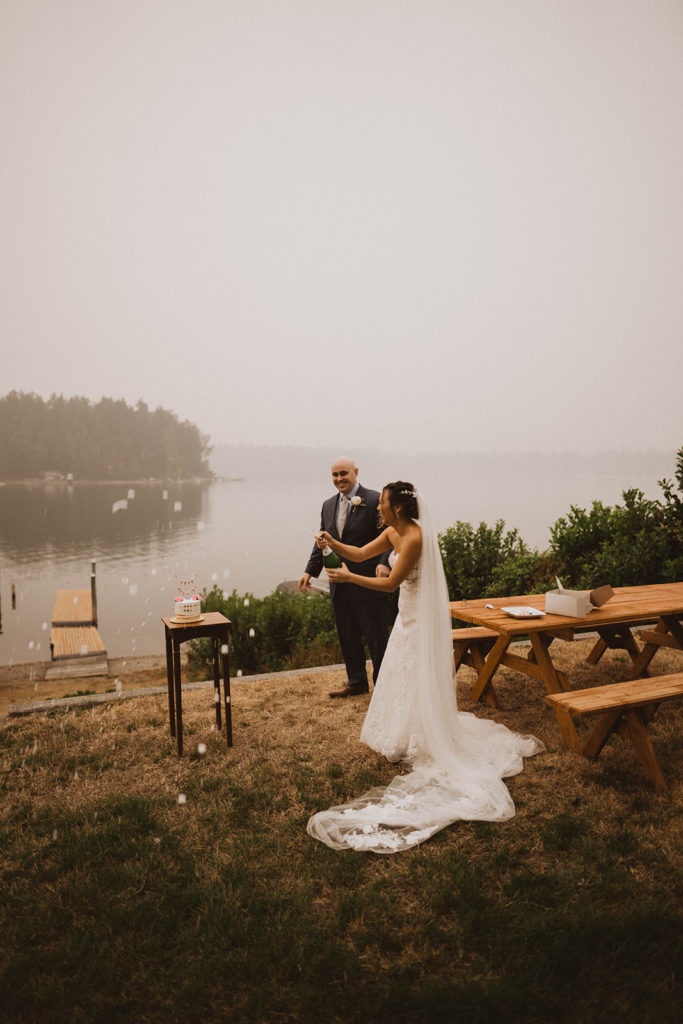 champagne spray by the bride during the elopement reception in Tacoma