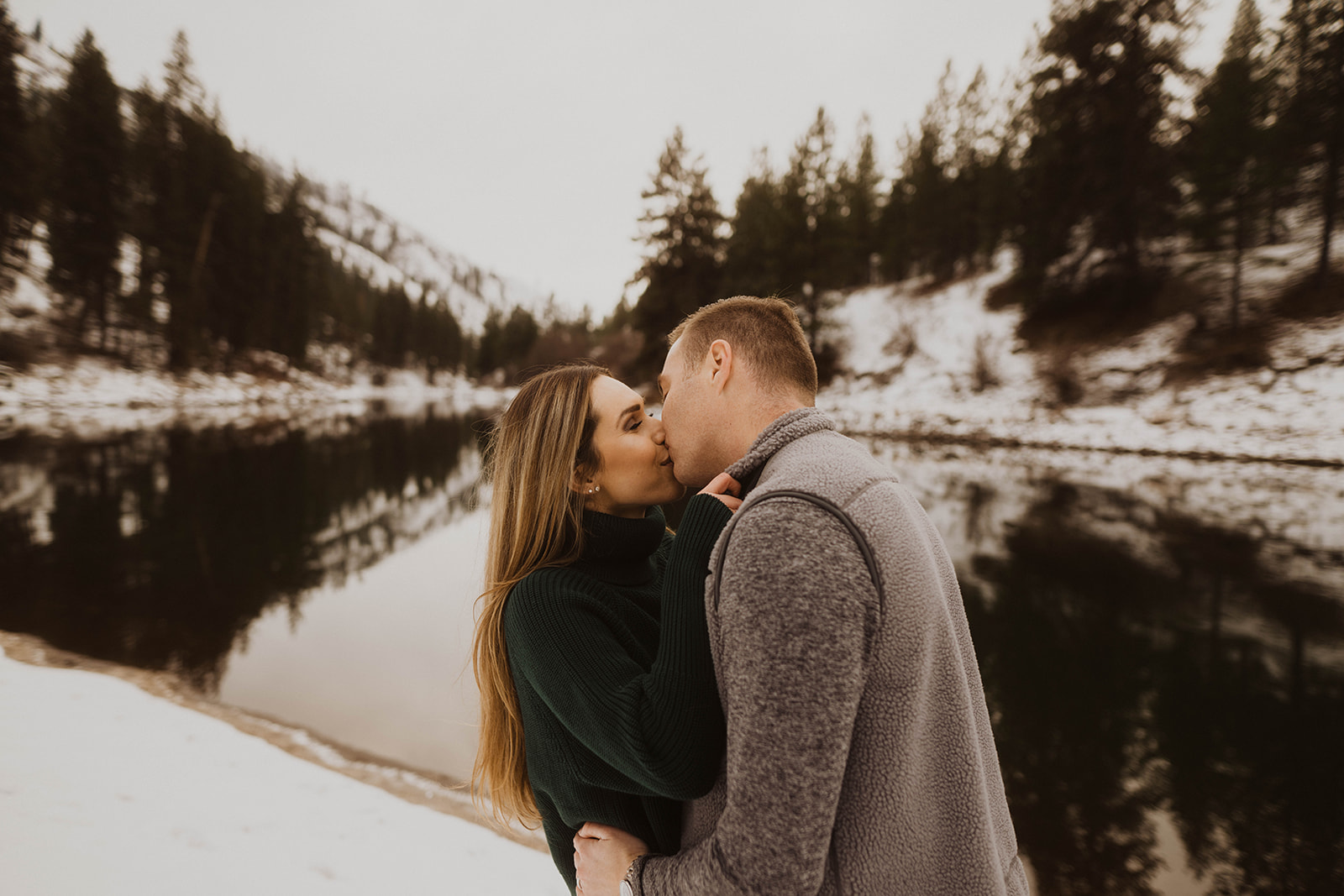 on the banks of the payette river a couple kisses