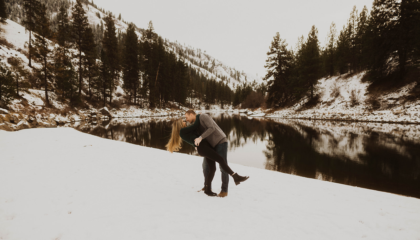 mountains in banks, idaho covered in snow during the payette river couple session