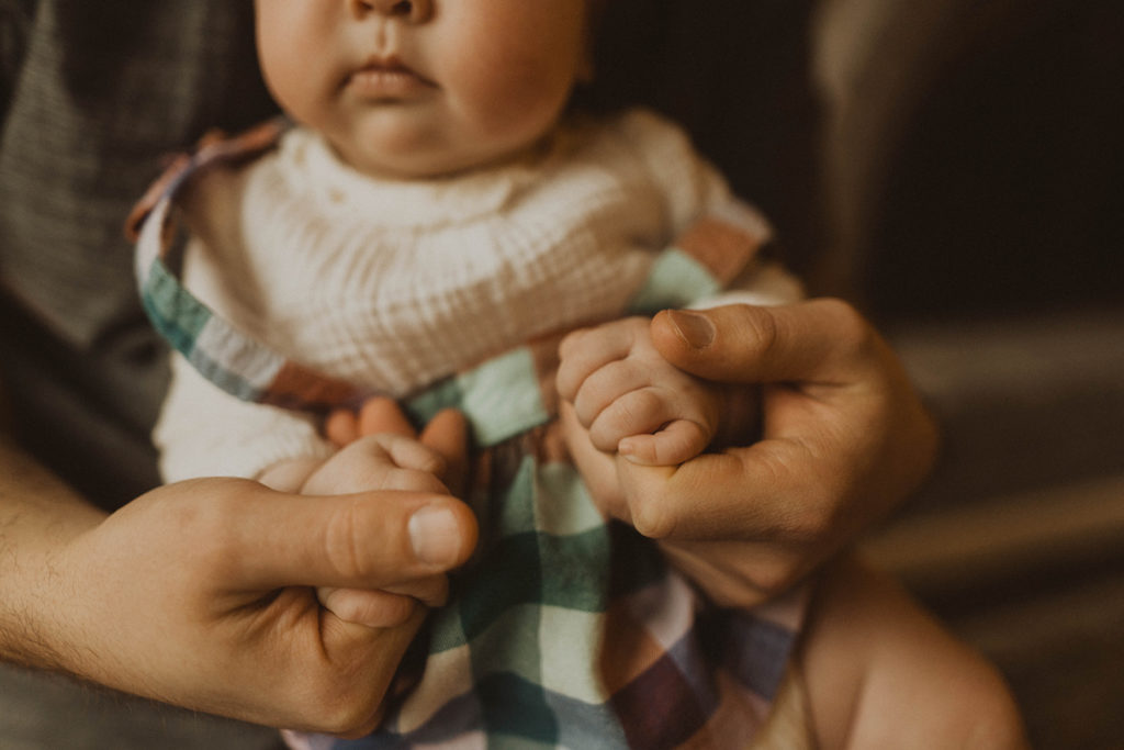 close up photo of newborn baby's hands during a Seattle Family Lifestyle Session