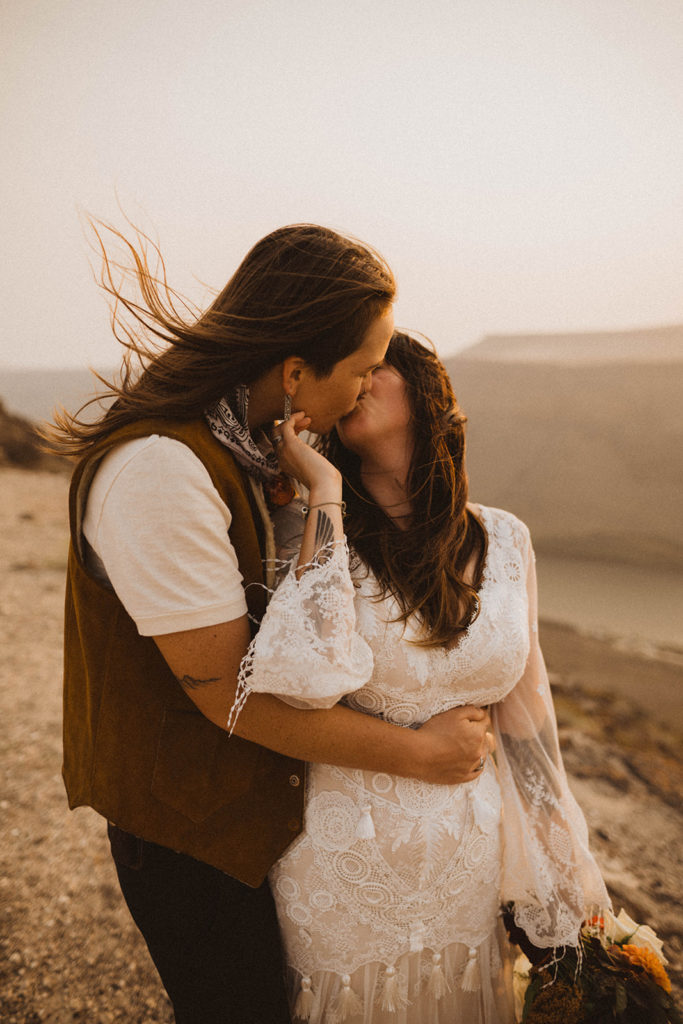 brides kiss during their elopement